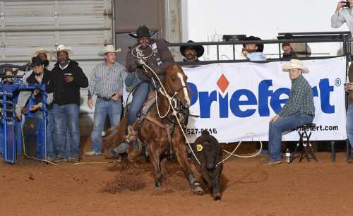 Layden Wynn roping at the 2024 Hooey Jr. Patriot 15 & Under Tie-Down Semifinals.