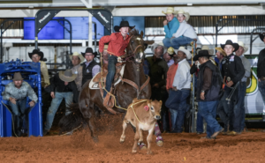 Jett Paker and family gelding "Deuce" got the win in the Hooey Jr. Patriot 12-and-under Breakaway Roping.