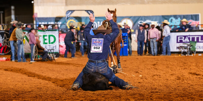 Brodey Clemons ties a calf at Patriot Event